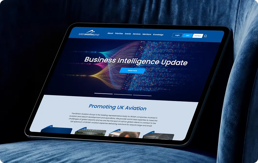 Business intelligence update page displayed on a laptop with aviation branding