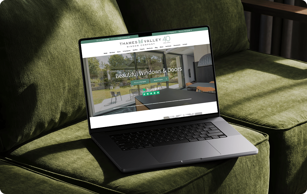 Windows website displayed on a laptop