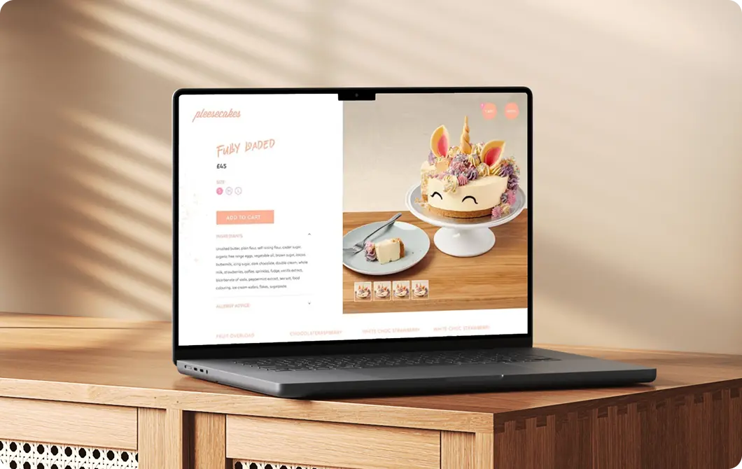 Bakery website design shown on a laptop with product photography and order form