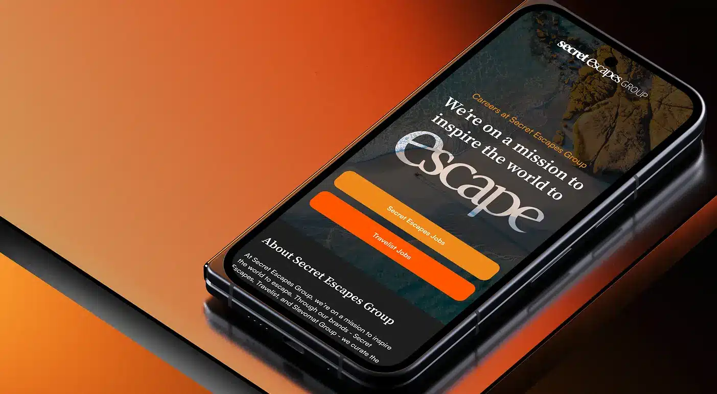 Secret Escapes careers website displayed on a smartphone with orange branding
