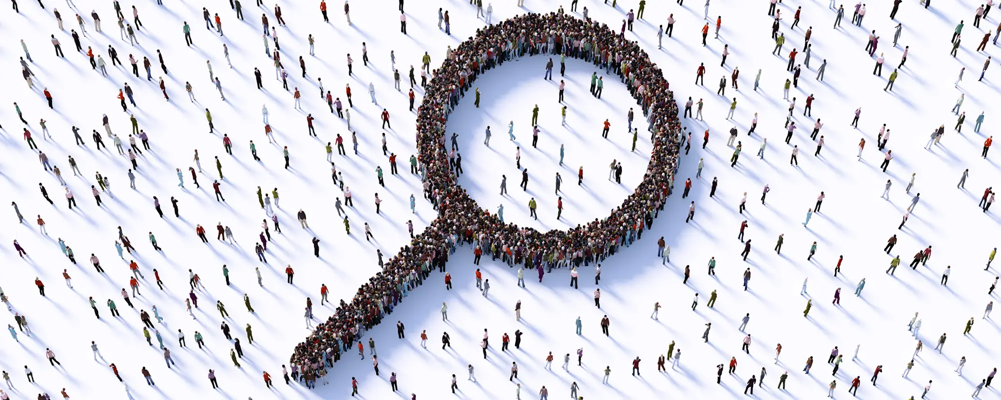 Crowd forming a magnifying glass symbolising talent search. Ideal for recruitment, hiring, candidate sourcing, and workforce analytics content.