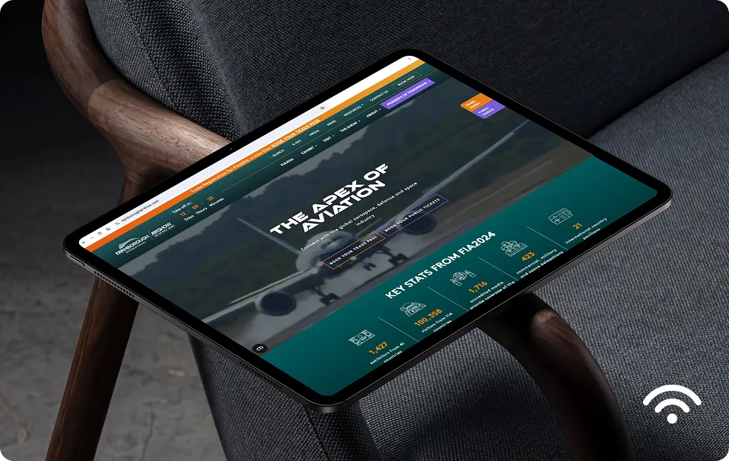 Recruitment website shown on a tablet with dark design and orange accents